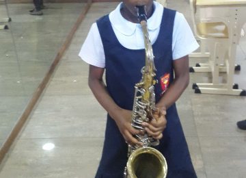 PLAYING TENOR SAX